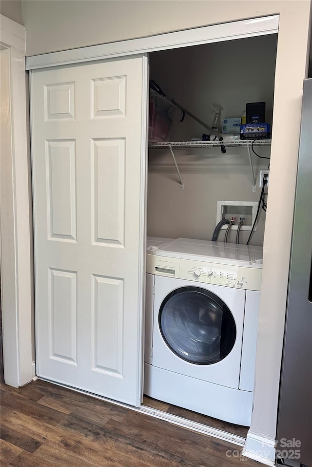 247 E Cabarrus Ave, Concord, NC 28025 - washroom featuring washer / dryer and dark wood-type flooring