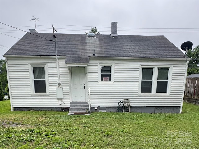 247 E Cabarrus Ave, Concord, NC 28025 - rear view of house with entry steps, crawl space, and a shingled roof