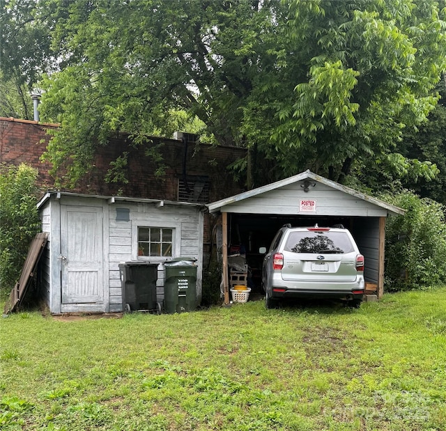 247 E Cabarrus Ave, Concord, NC 28025 - view of front of property featuring a front lawn and an outbuilding