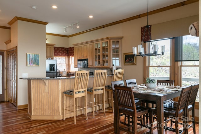 140 Slickrock Rd Unit F3, Burnsville, NC 28714 - dining room featuring crown molding, recessed lighting, an inviting chandelier, and wood finished floors