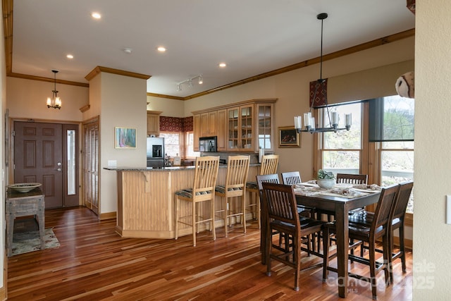 140 Slickrock Rd Unit F3, Burnsville, NC 28714 - dining area with recessed lighting, a chandelier, crown molding, and wood finished floors