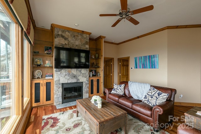 140 Slickrock Rd Unit F3, Burnsville, NC 28714 - living room featuring crown molding, a wealth of natural light, and wood finished floors