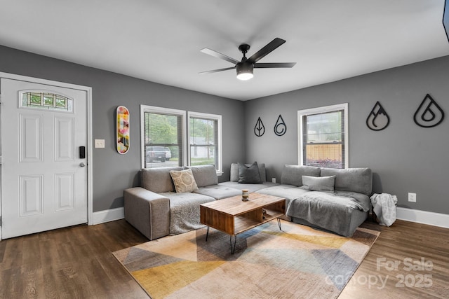 2212 Acme Rd, Belmont, NC 28012 - living area with a ceiling fan, wood finished floors, and baseboards