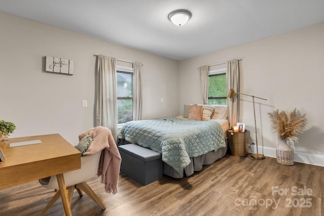 2212 Acme Rd, Belmont, NC 28012 - bedroom with wood finished floors, a desk, and baseboards