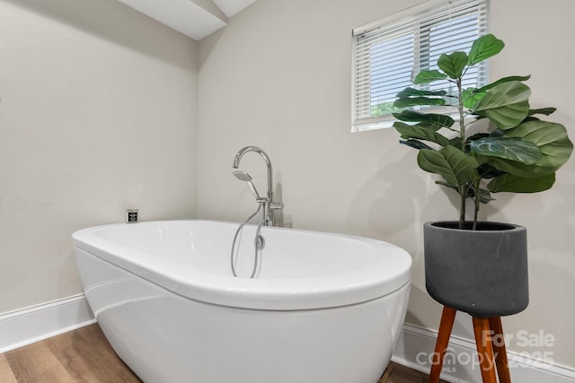 2212 Acme Rd, Belmont, NC 28012 - clothes washing area featuring wood finished floors and baseboards
