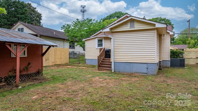 2212 Acme Rd, Belmont, NC 28012 - rear view of house with central AC