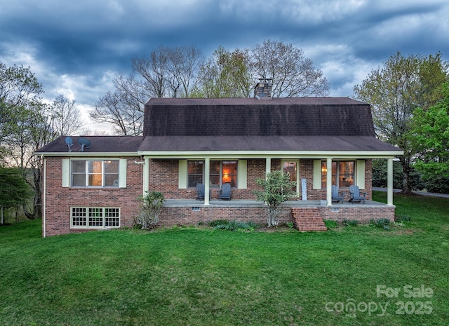 184 Buff Ridge Rd, Boone, NC 28607 - view of front of property featuring brick siding, a chimney, a front yard, and covered porch
