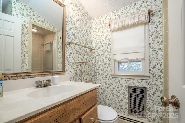 184 Buff Ridge Rd, Boone, NC 28607 - full bathroom with wallpapered walls, toilet, vanity, baseboard heating, and a textured ceiling