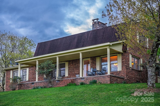 184 Buff Ridge Rd, Boone, NC 28607 - view of front of home with a porch, a front yard, a shingled roof, and a chimney