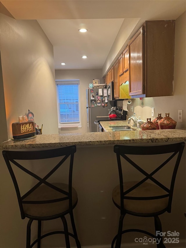 303 Heritage Pkwy, Fort Mill, SC 29715 - bar area featuring a sink, stainless steel appliances, and recessed lighting