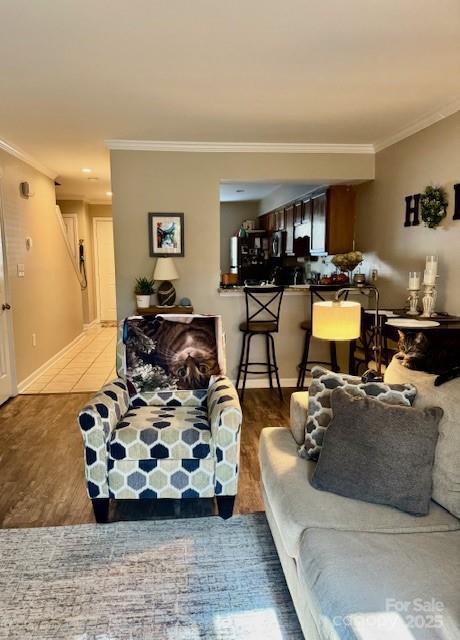 303 Heritage Pkwy, Fort Mill, SC 29715 - living area with ornamental molding and wood finished floors