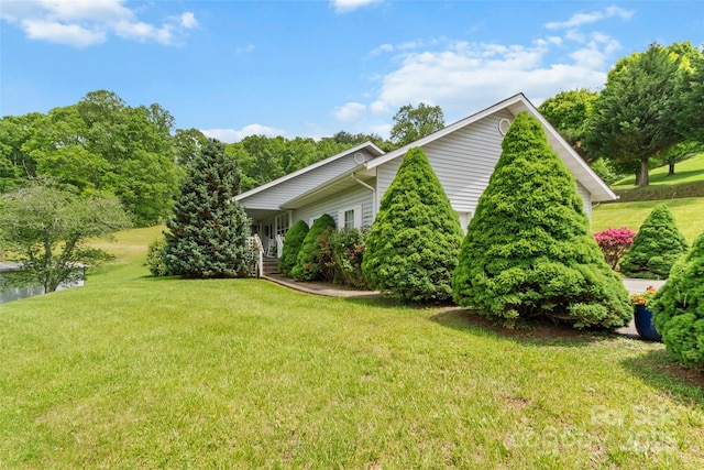 17 Gun Flint Dr, Burnsville, NC 28714 - view of side of home featuring a yard and a porch