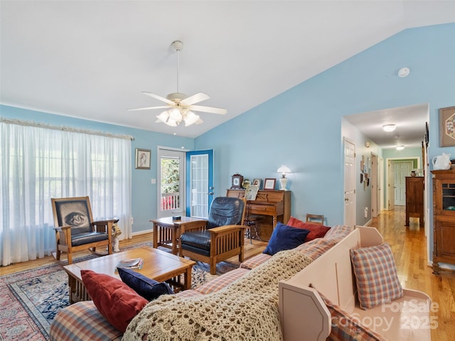 17 Gun Flint Dr, Burnsville, NC 28714 - living room featuring light wood finished floors, a ceiling fan, french doors, high vaulted ceiling, and baseboards