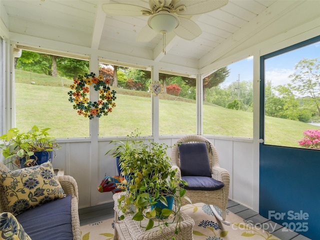 17 Gun Flint Dr, Burnsville, NC 28714 - sunroom with a ceiling fan and beam ceiling