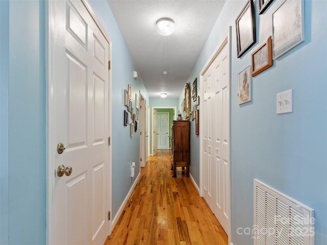 17 Gun Flint Dr, Burnsville, NC 28714 - corridor with light wood-style flooring and baseboards