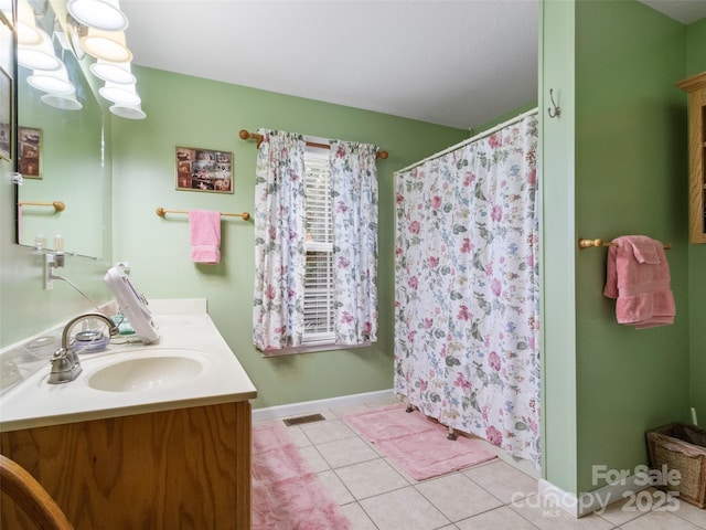 17 Gun Flint Dr, Burnsville, NC 28714 - bathroom featuring vanity, tile patterned floors, a shower with curtain, and baseboards