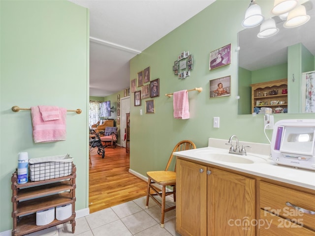 17 Gun Flint Dr, Burnsville, NC 28714 - bathroom featuring tile patterned floors, vanity, and a chandelier