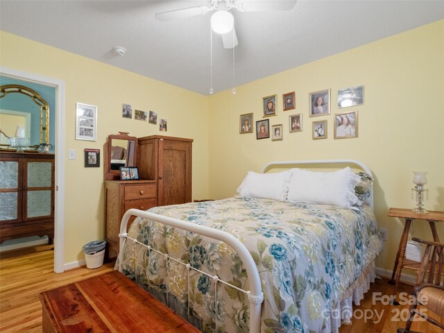 17 Gun Flint Dr, Burnsville, NC 28714 - bedroom featuring wood finished floors, baseboards, and a ceiling fan