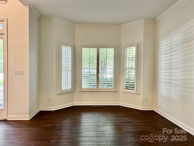 9907 Furlong Trl, Charlotte, NC 28269 - empty room featuring hardwood / wood-style flooring, baseboards, and ornamental molding