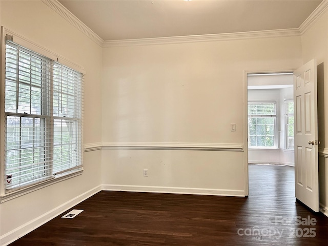 9907 Furlong Trl, Charlotte, NC 28269 - unfurnished room with ornamental molding, dark wood-style floors, and baseboards