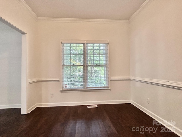 9907 Furlong Trl, Charlotte, NC 28269 - unfurnished room with dark wood-style floors, crown molding, and baseboards