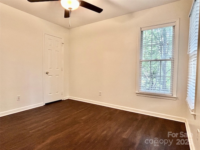 9907 Furlong Trl, Charlotte, NC 28269 - unfurnished room with plenty of natural light, a ceiling fan, and baseboards