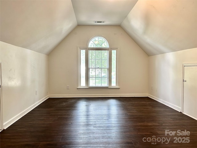 9907 Furlong Trl, Charlotte, NC 28269 - bonus room with lofted ceiling, hardwood / wood-style flooring, and baseboards