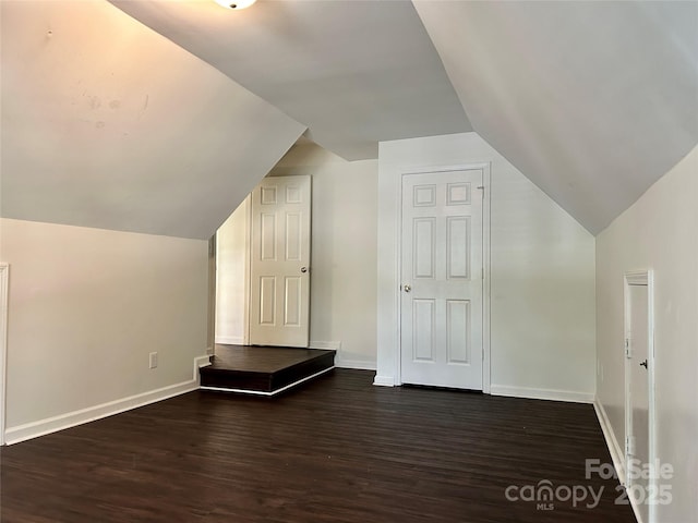 9907 Furlong Trl, Charlotte, NC 28269 - bonus room with dark wood-type flooring, lofted ceiling, and baseboards