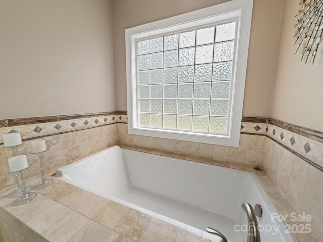 full bathroom with a garden tub