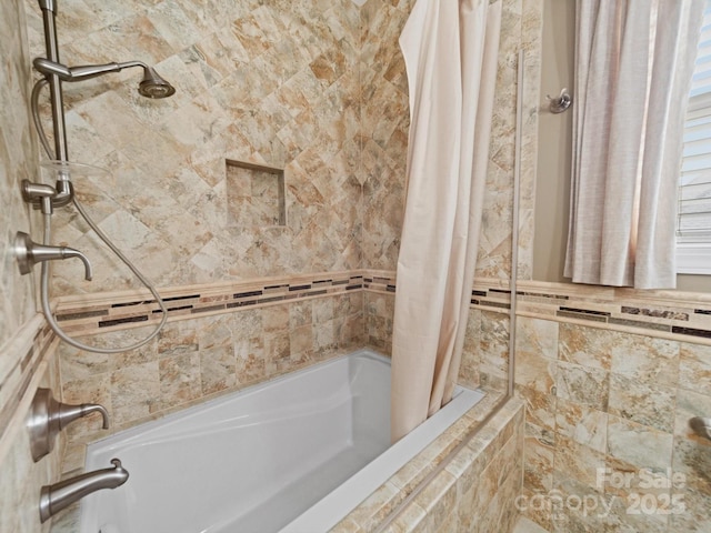 full bathroom featuring tiled shower / bath