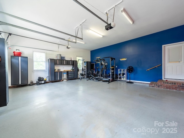 garage featuring a garage door opener