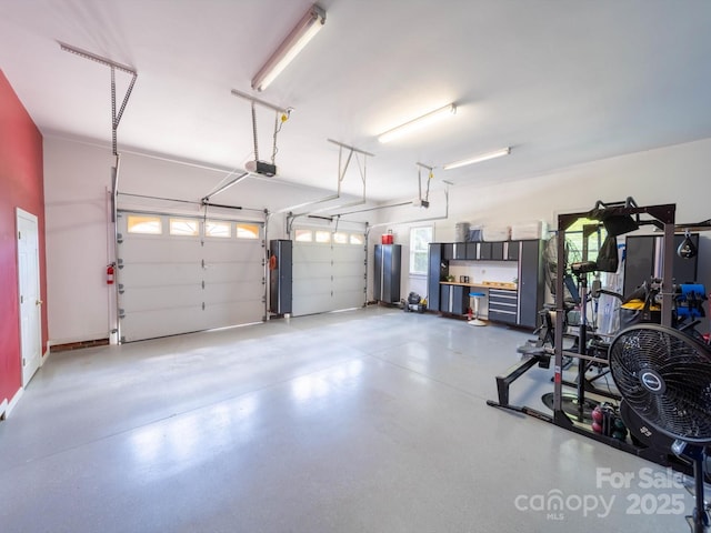 garage featuring a garage door opener