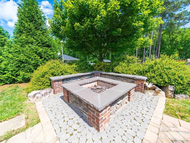 view of patio / terrace featuring a fire pit
