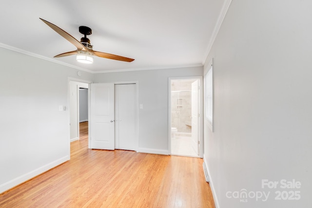 2001 Tyvola Rd, Charlotte, NC 28210 - unfurnished bedroom with baseboards, ornamental molding, light wood finished floors, a closet, and connected bathroom