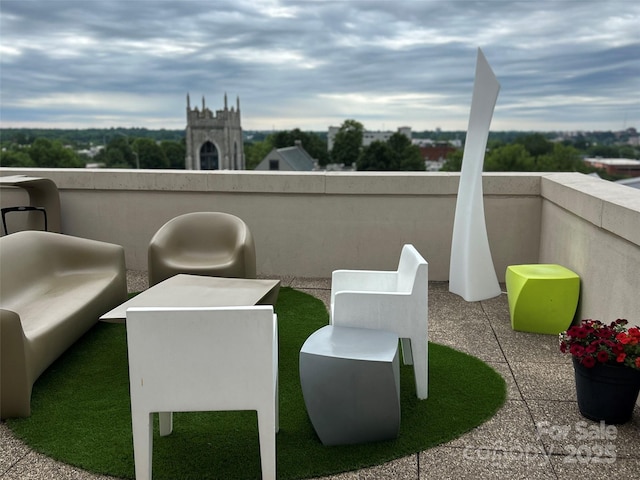 715 N Church St Unit 213, Charlotte, NC 28202 - view of patio featuring a balcony