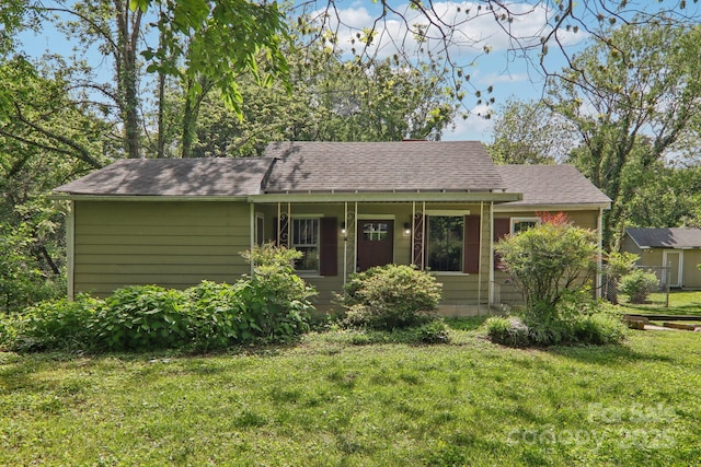 135.5 Virginia Ave, Asheville, NC 28806 - single story home featuring a front lawn and roof with shingles