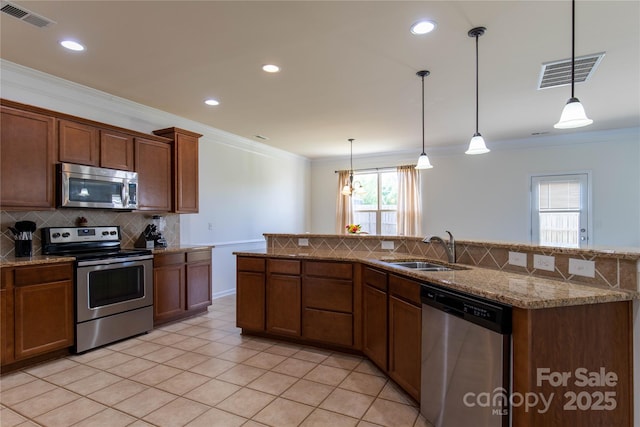 159 Saye Pl, Mooresville, NC 28115 - kitchen featuring stainless steel appliances, crown molding, backsplash, light tile patterned flooring, and decorative light fixtures