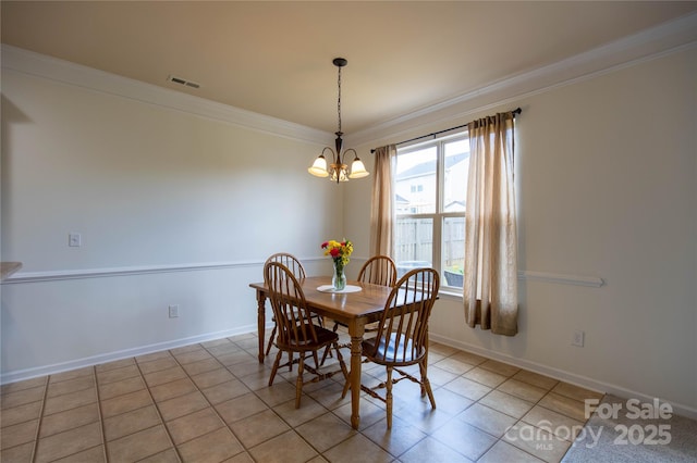 159 Saye Pl, Mooresville, NC 28115 - dining room with ornamental molding, a chandelier, and light tile patterned floors