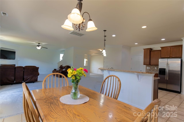 159 Saye Pl, Mooresville, NC 28115 - dining room with light tile patterned floors, a ceiling fan, and recessed lighting