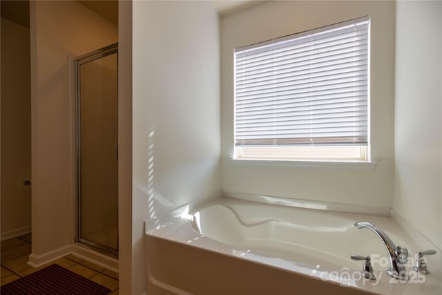 159 Saye Pl, Mooresville, NC 28115 - full bathroom featuring a shower stall, a bath, and tile patterned floors