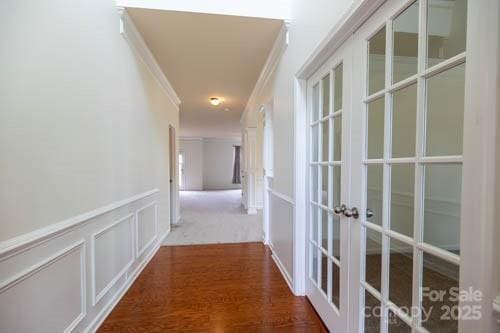 159 Saye Pl, Mooresville, NC 28115 - hall featuring french doors, crown molding, and wood finished floors