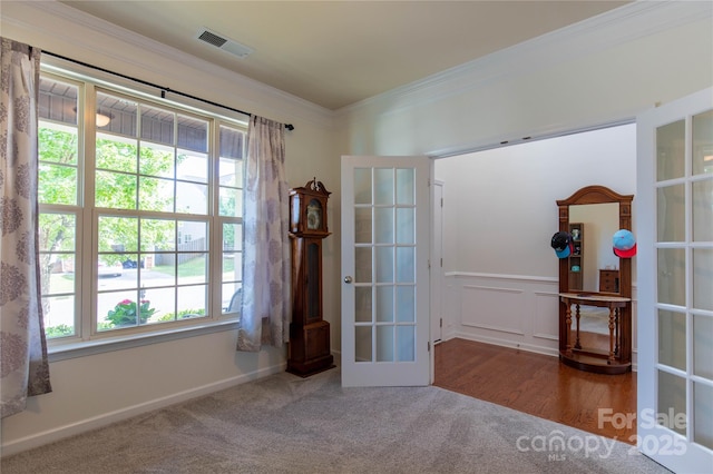 159 Saye Pl, Mooresville, NC 28115 - empty room featuring french doors, healthy amount of natural light, crown molding, and carpet flooring