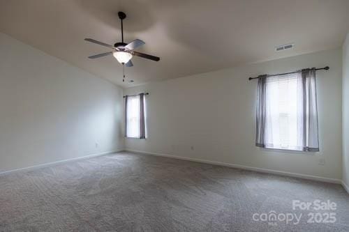 159 Saye Pl, Mooresville, NC 28115 - spare room with a ceiling fan and carpet
