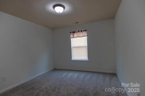 159 Saye Pl, Mooresville, NC 28115 - carpeted spare room with baseboards