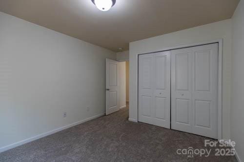 159 Saye Pl, Mooresville, NC 28115 - unfurnished bedroom with carpet floors and a closet