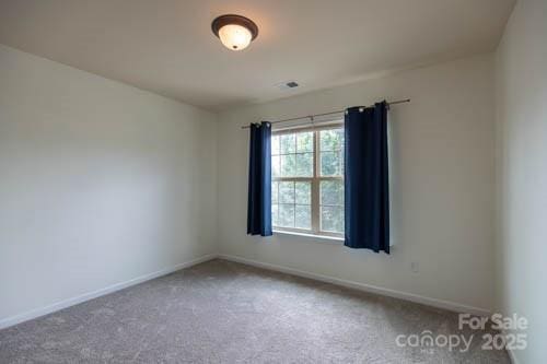 159 Saye Pl, Mooresville, NC 28115 - empty room featuring carpet floors and baseboards