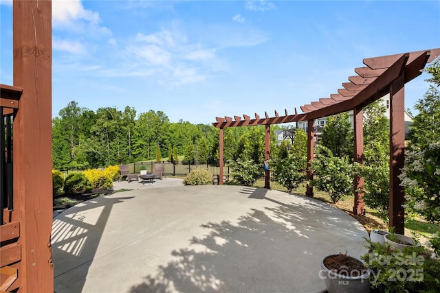 view of patio / terrace featuring fence