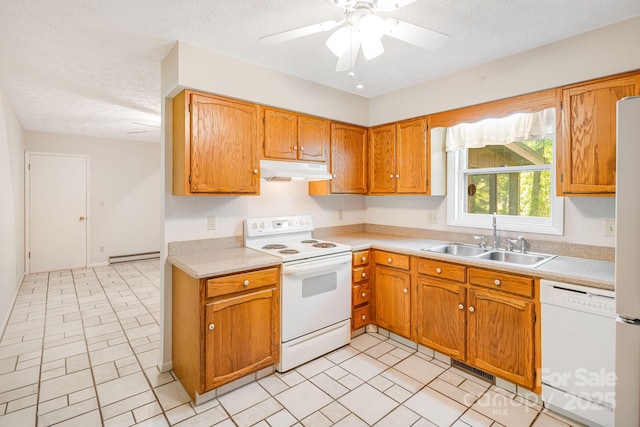 3127 Butler Bridge Rd, Mills River, NC 28759 - kitchen with white appliances, a sink, under cabinet range hood, light countertops, and a textured ceiling