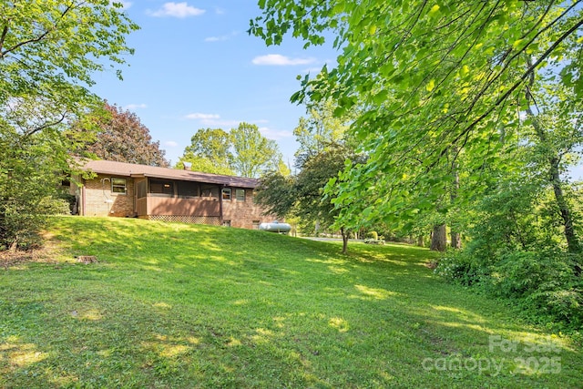 3127 Butler Bridge Rd, Mills River, NC 28759 - view of green lawn featuring a sunroom
