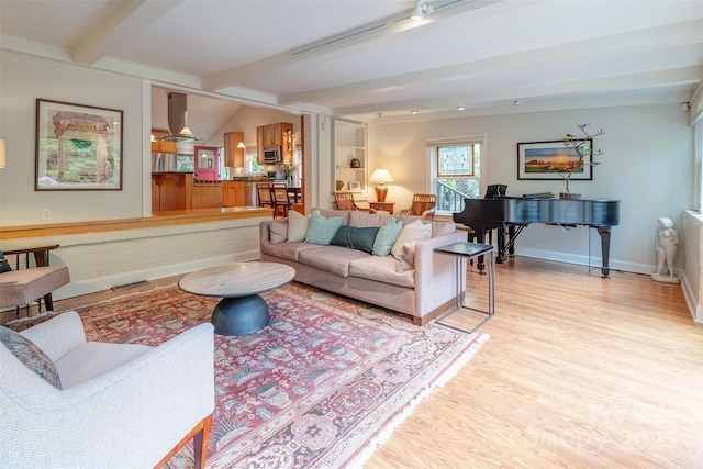 47 Lakeview Rd, Asheville, NC 28804 - living area featuring light wood-type flooring, beam ceiling, and baseboards
